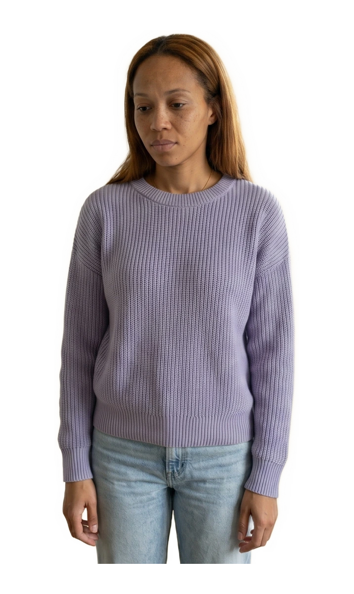 Before view: A woman shown washed out in incorrect colors and glowing in harmonious colors.